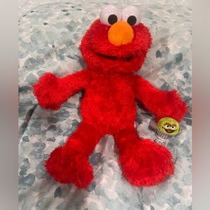 Tickle me, Elmo, and a tiny Oscar from Sesame Street official merchandise